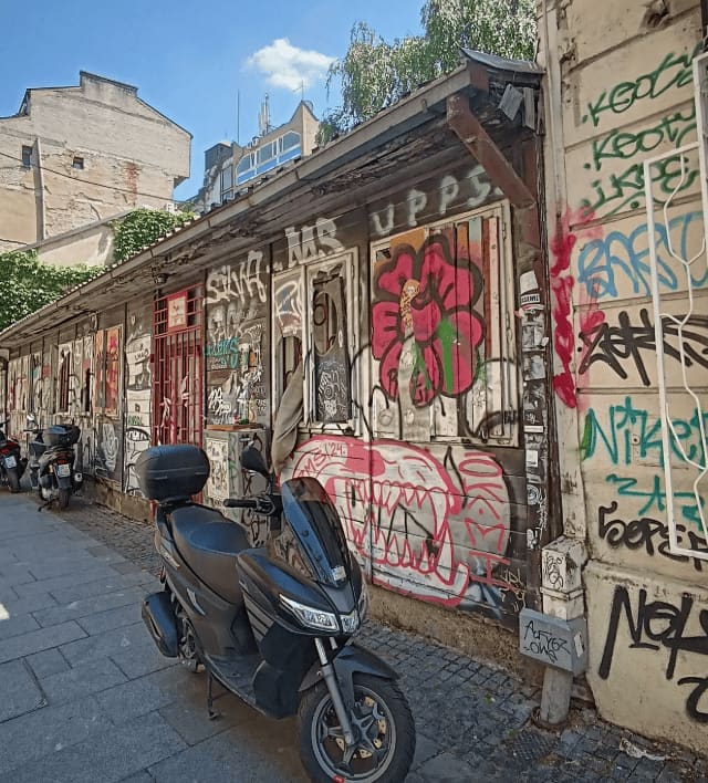 a scooter, and everything written behind it