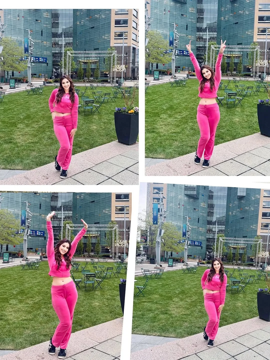 Samaira Sandhu smiling and posing in a bright pink velour tracksuit with a cropped top and flared pants, standing in an urban park with modern buildings in the background.