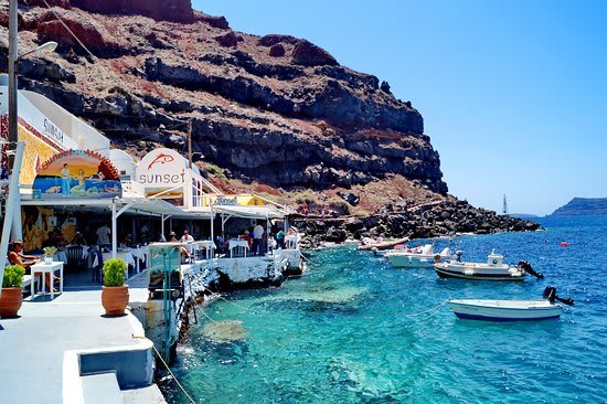 Restaurant By The Sea With Boats