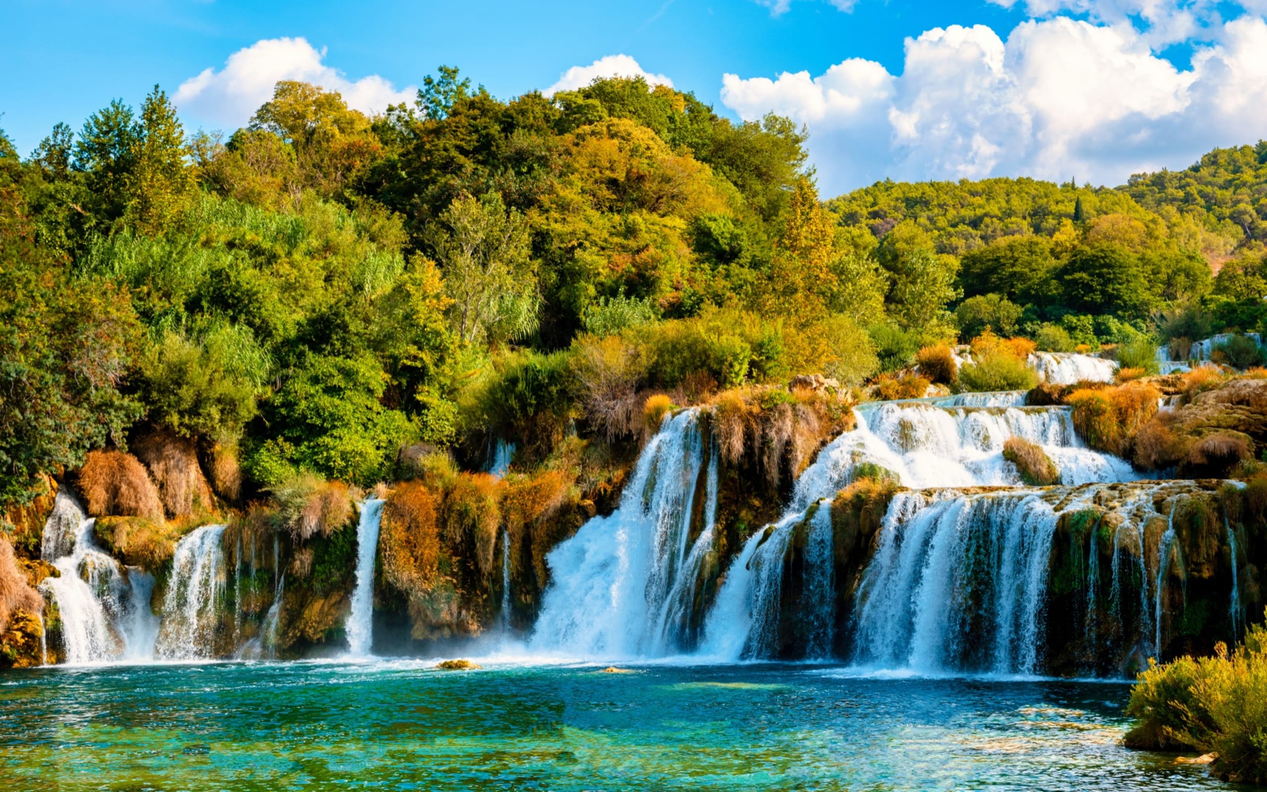 KRKA waterfalls Croatia during summer, Krka National Park Croatia on a bright summer evening in the park at sunset.