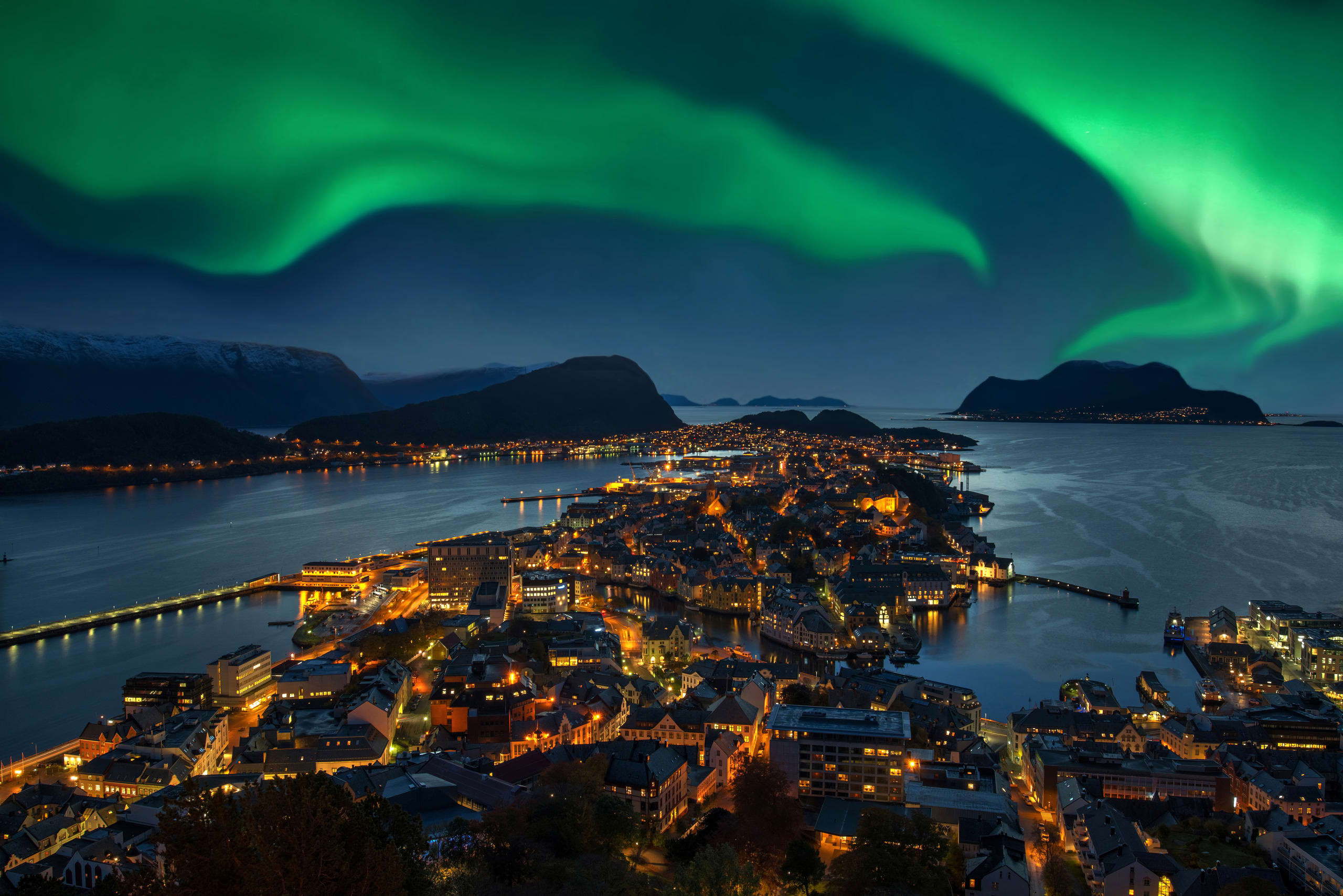 Green Aurora borealis over Alesund, Norway.