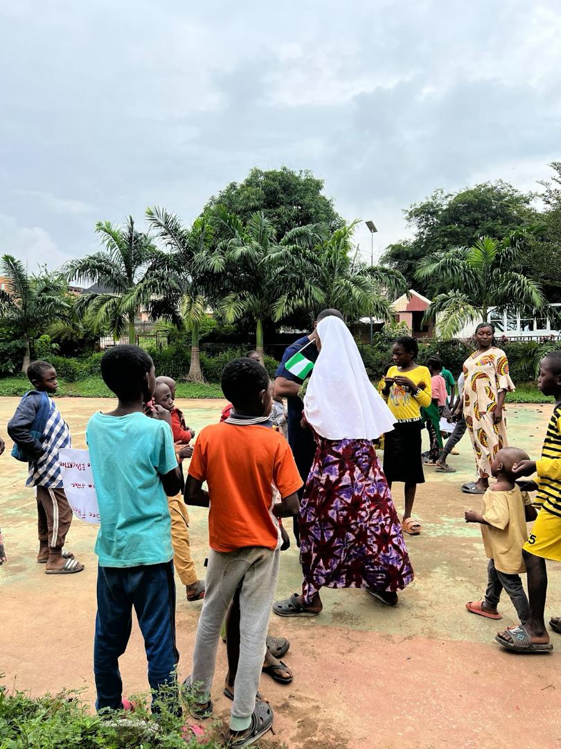 Children participating enthusiastically in the civic education session