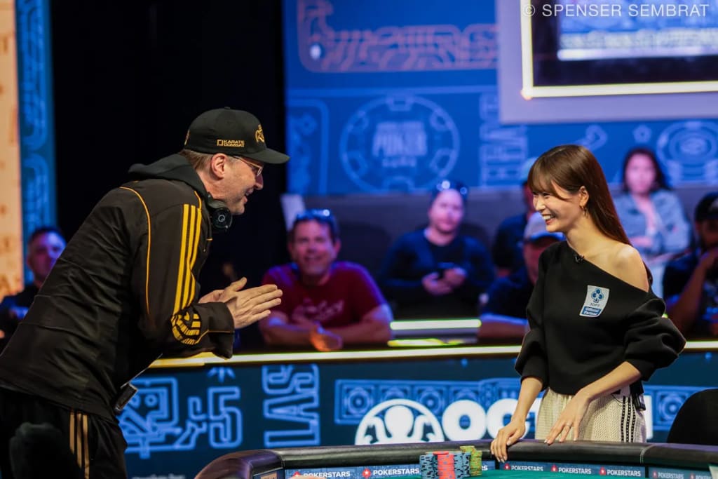 Phil Hellmuth congratulates Shiina Okamoto