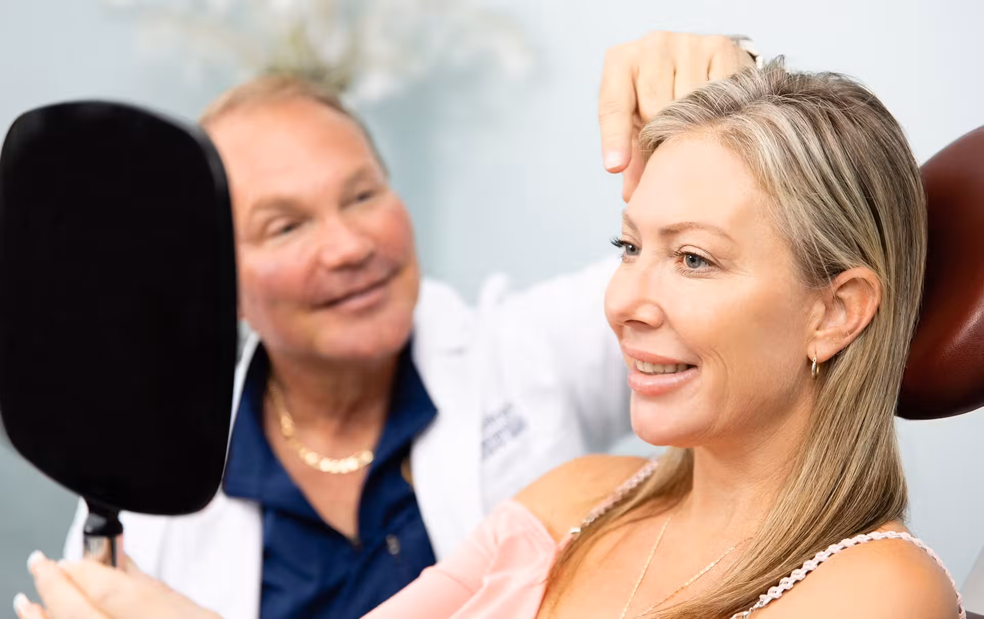 Dr Young with working with patient