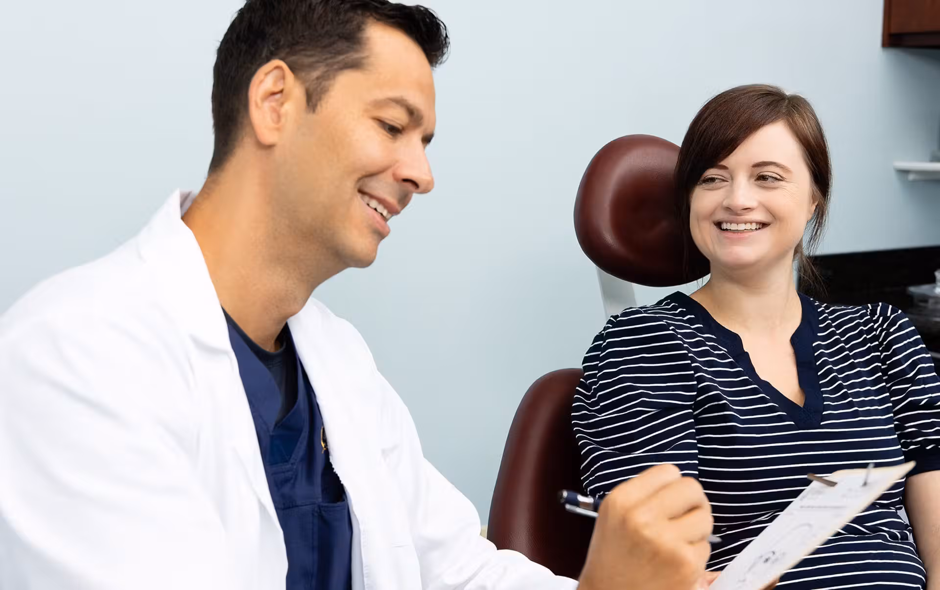 Doctor going over chart with patient