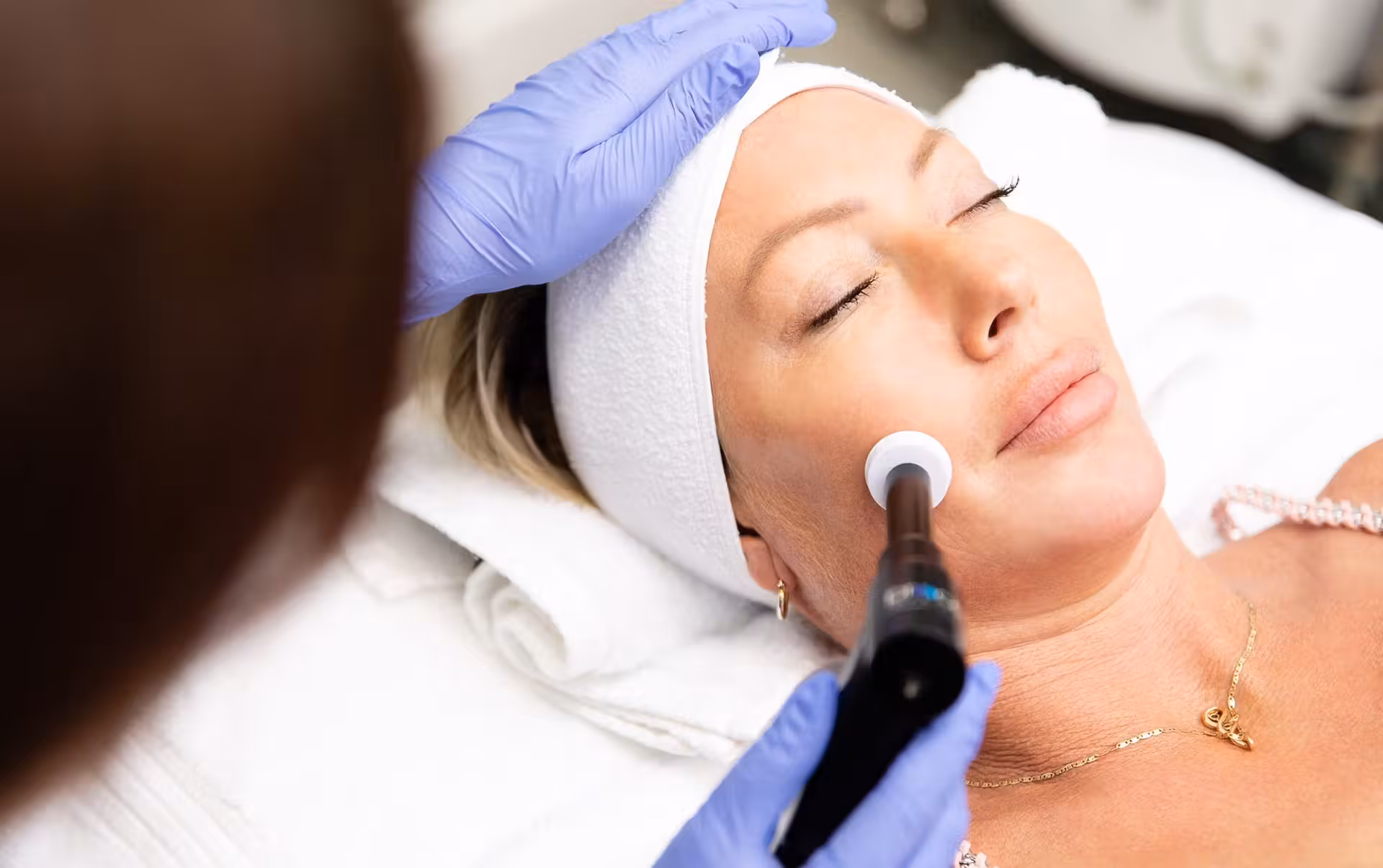 Woman getting facial services