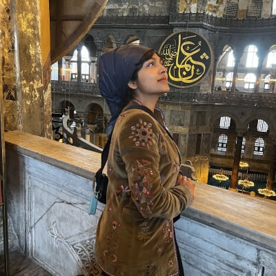 Dee inside the Hagia Sophia, Istanbul, looking up in awe