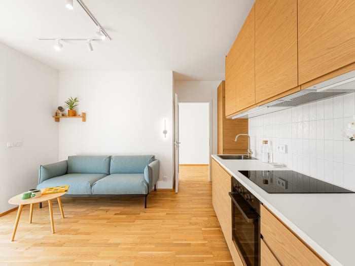 Living room with oak kitchen, Fafkových — managed unit