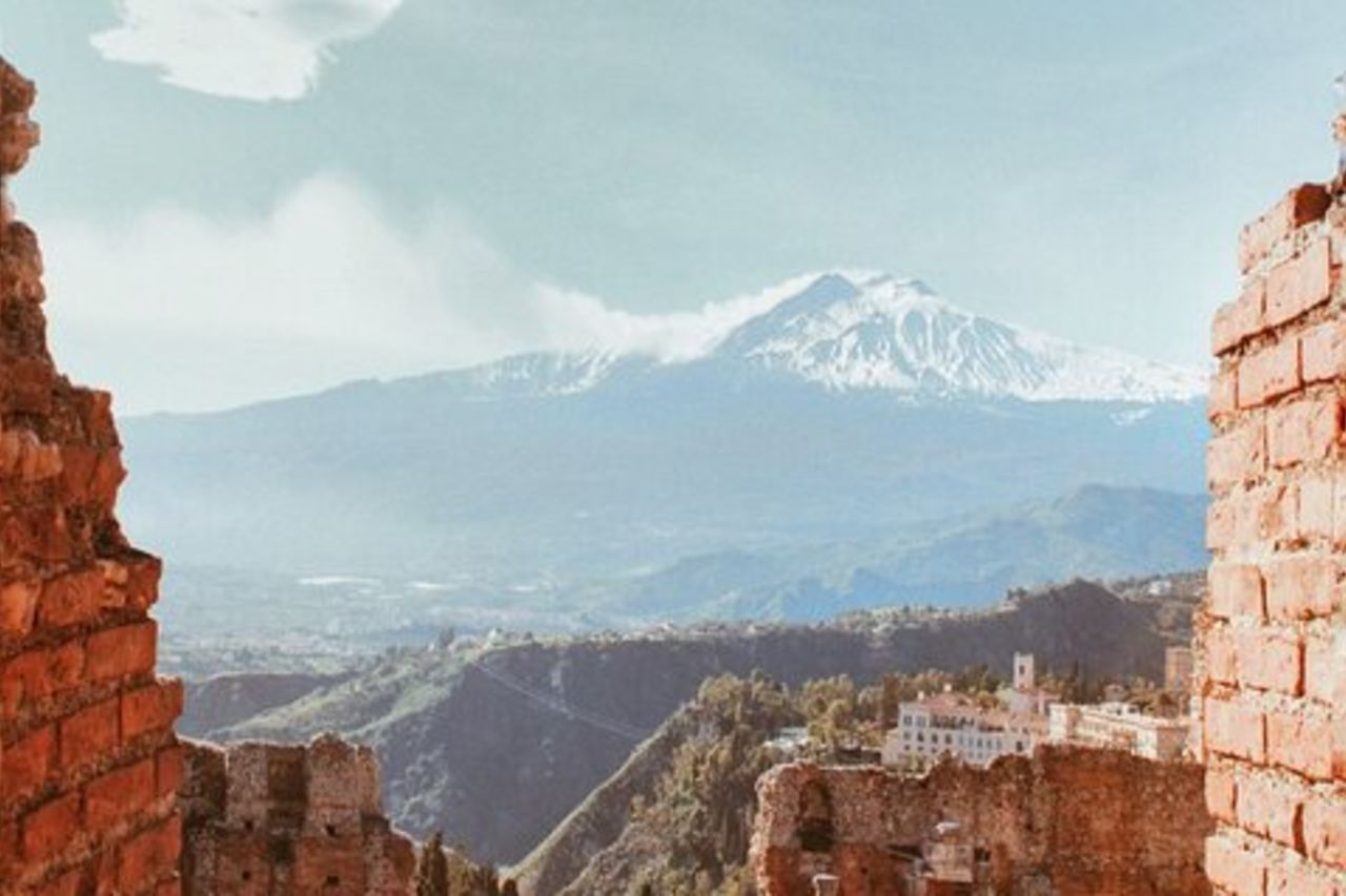 Tour a piedi al tramonto di Taormina con vino, pizza e cannoli