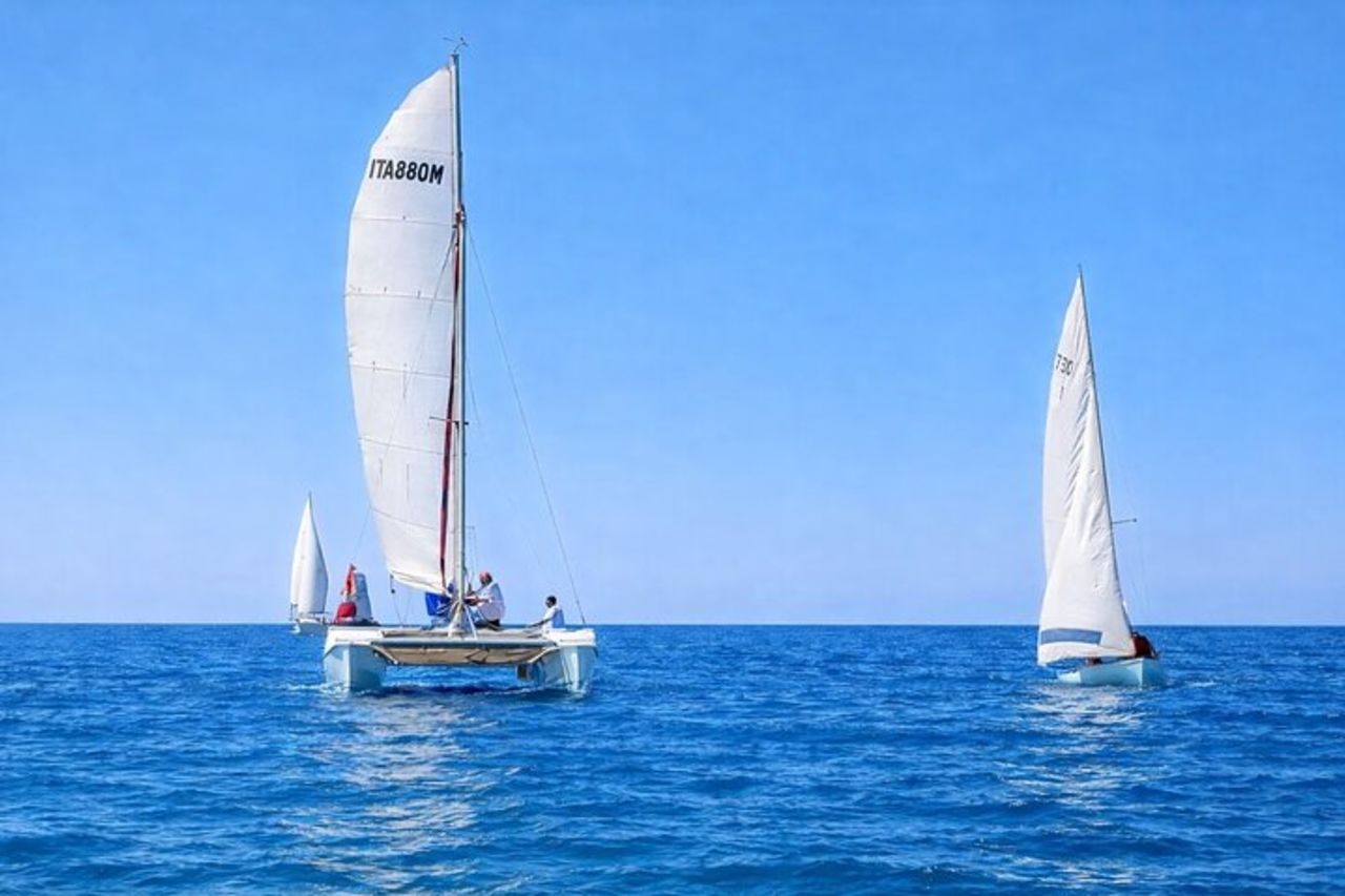 Porto Cesareo Lezione Tour Avventura Catamarano vela — 2