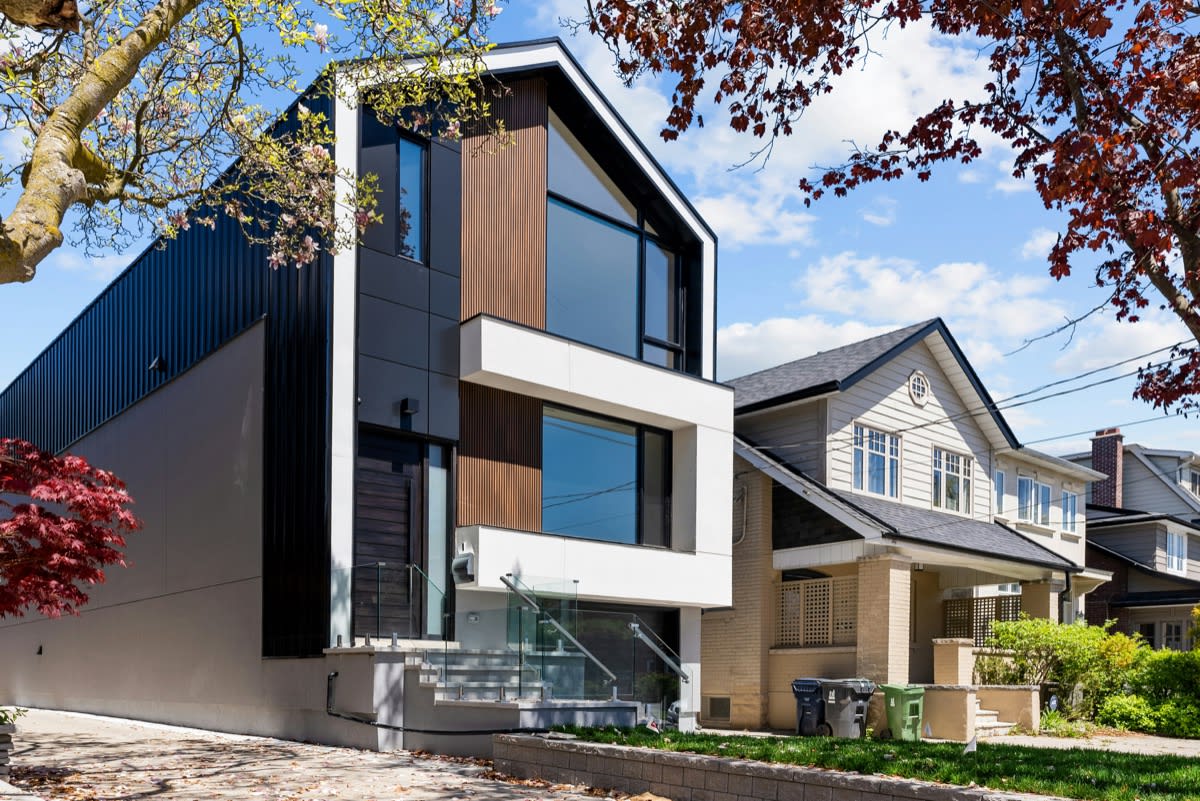 Black-timber home exterior, shown in a mobile preview of a generated SURFACE. article page