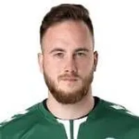Dominik Holecdisparo a la cabeza
