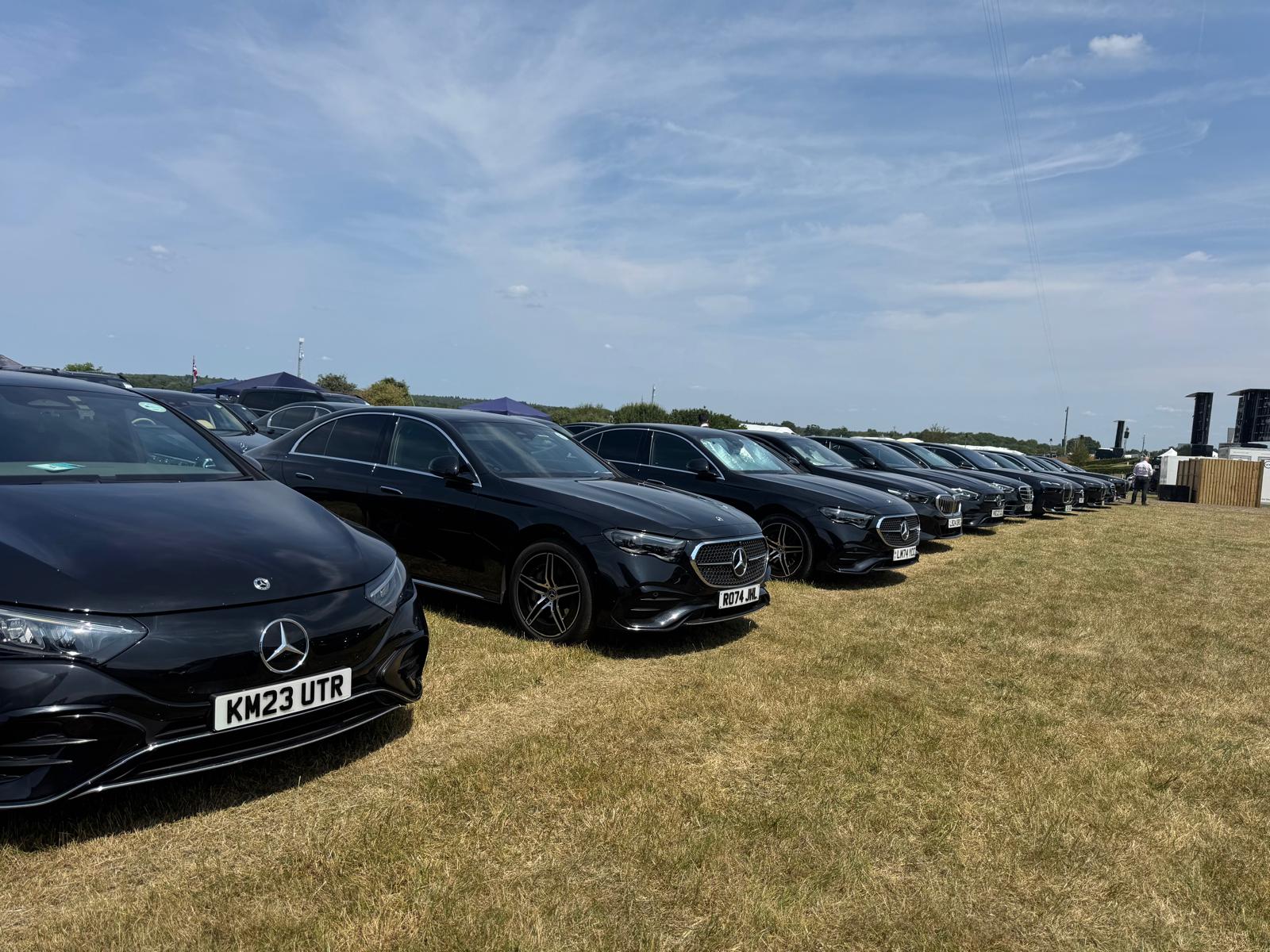 Sustainable, silent luxury. Travel with a clear conscience in our fleet of premium electric vehicles (Mercedes EQS, BMW i7).