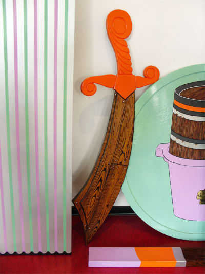 Gallery documentation of an installation of painted sculptures