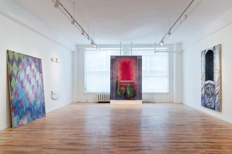 Gallery documentation of an installation of paintings with architectural framing