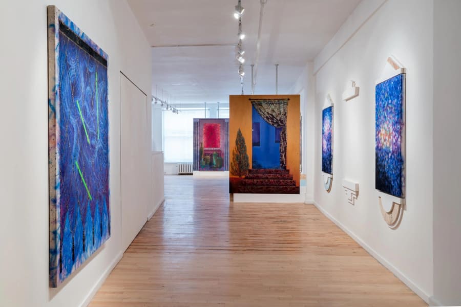 Gallery documentation of an installation of paintings with architectural framing