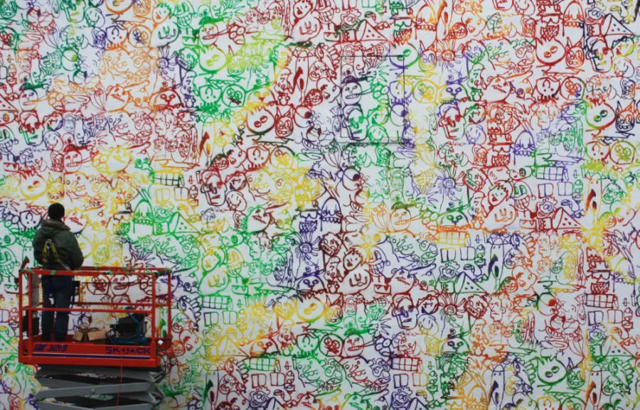 Exterior image of a large, graffiti inspired mural
