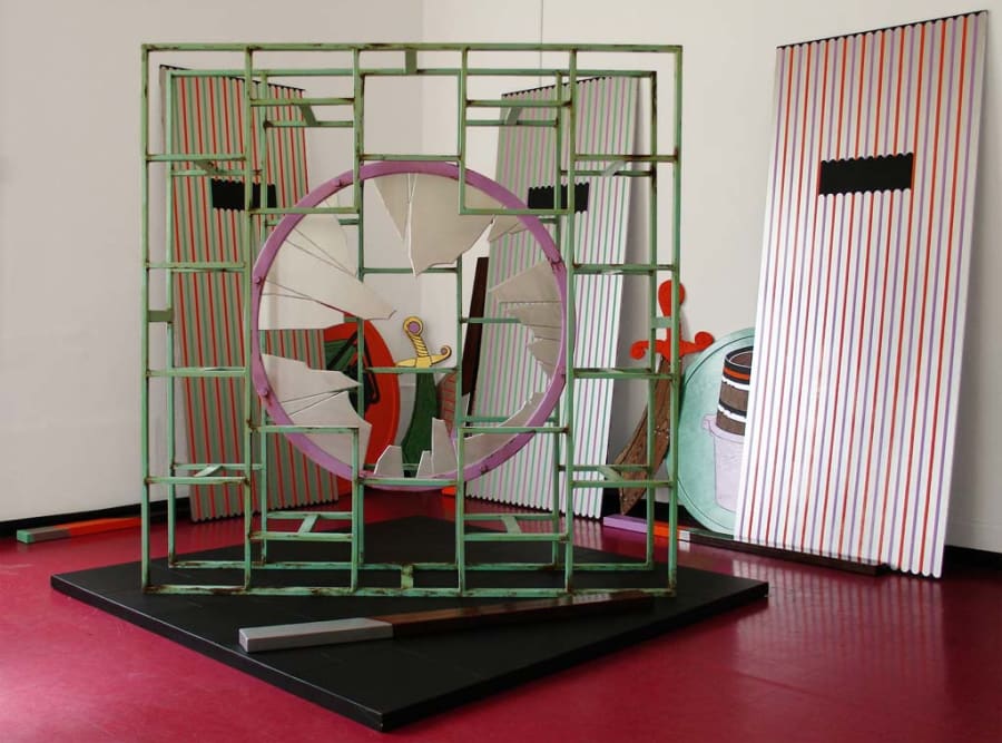 Gallery documentation of an installation of painted sculptures