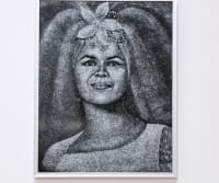 Image of a painting exhibition installed in an art gallery.