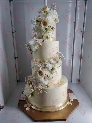 Four Tier White Wedding Cake with Floral Cascade Islamabad