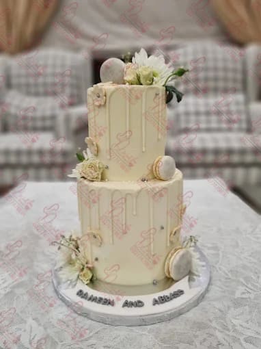Two Tier White Drip Wedding Cake Rawalpindi