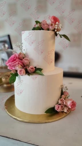 Two Tier White Buttercream Cake with Pink Roses Rawalpindi