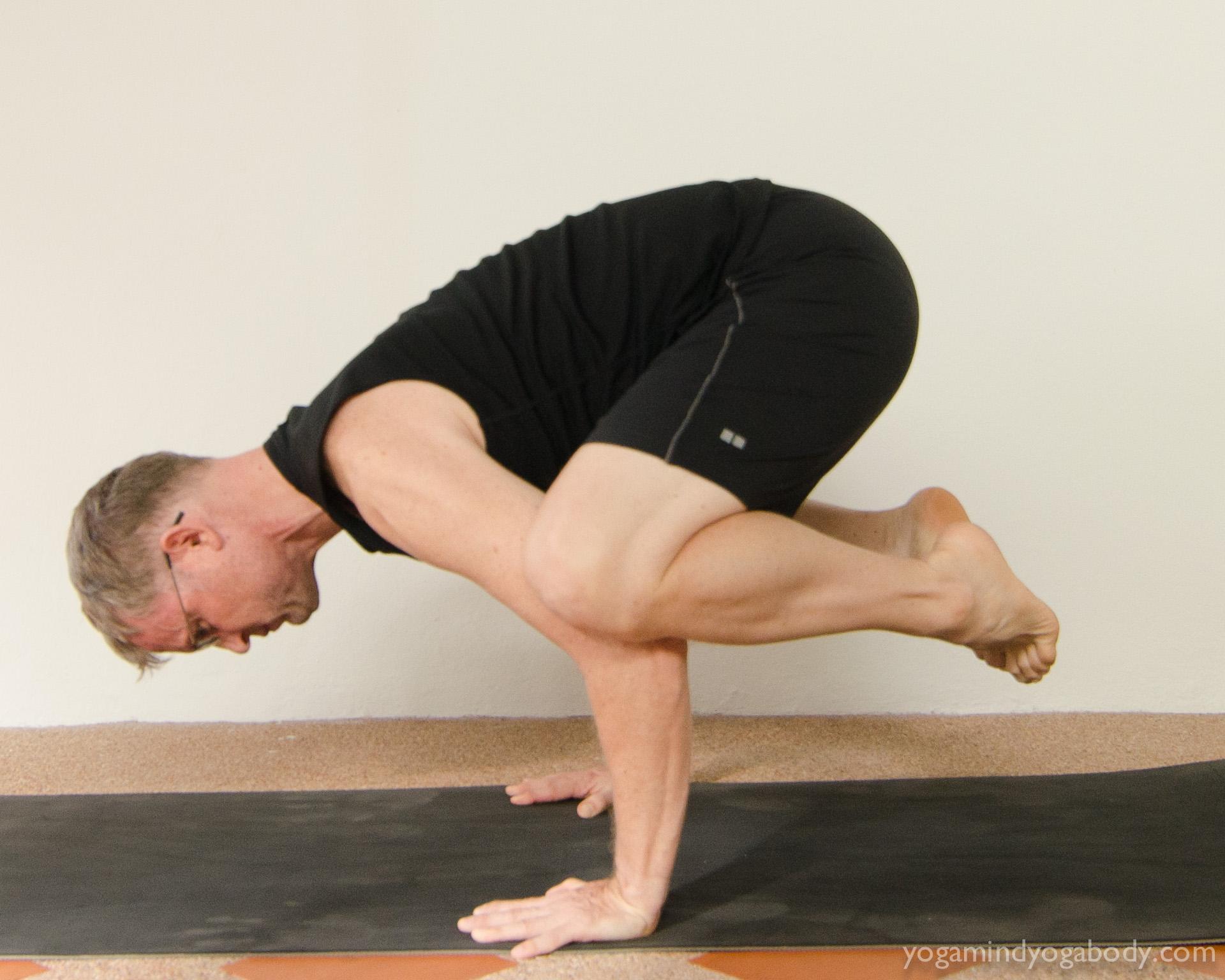 Learn to practice arm balances without neck tension