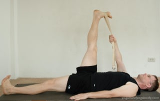 Yoga Teacher Gernot Huber in Supta Padangusthasana 1
