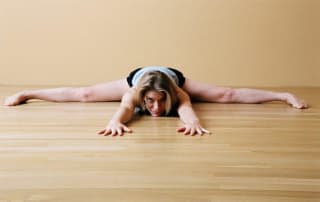 Jill Miller in Deep Side Splits failing to balance Muscular and Organic Energies.