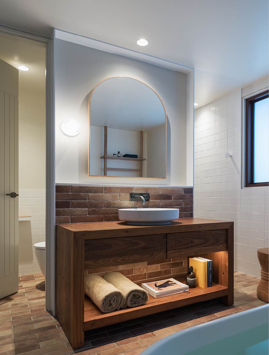 Humble materiality paired with modern amenity within the Euston Motel Cabins