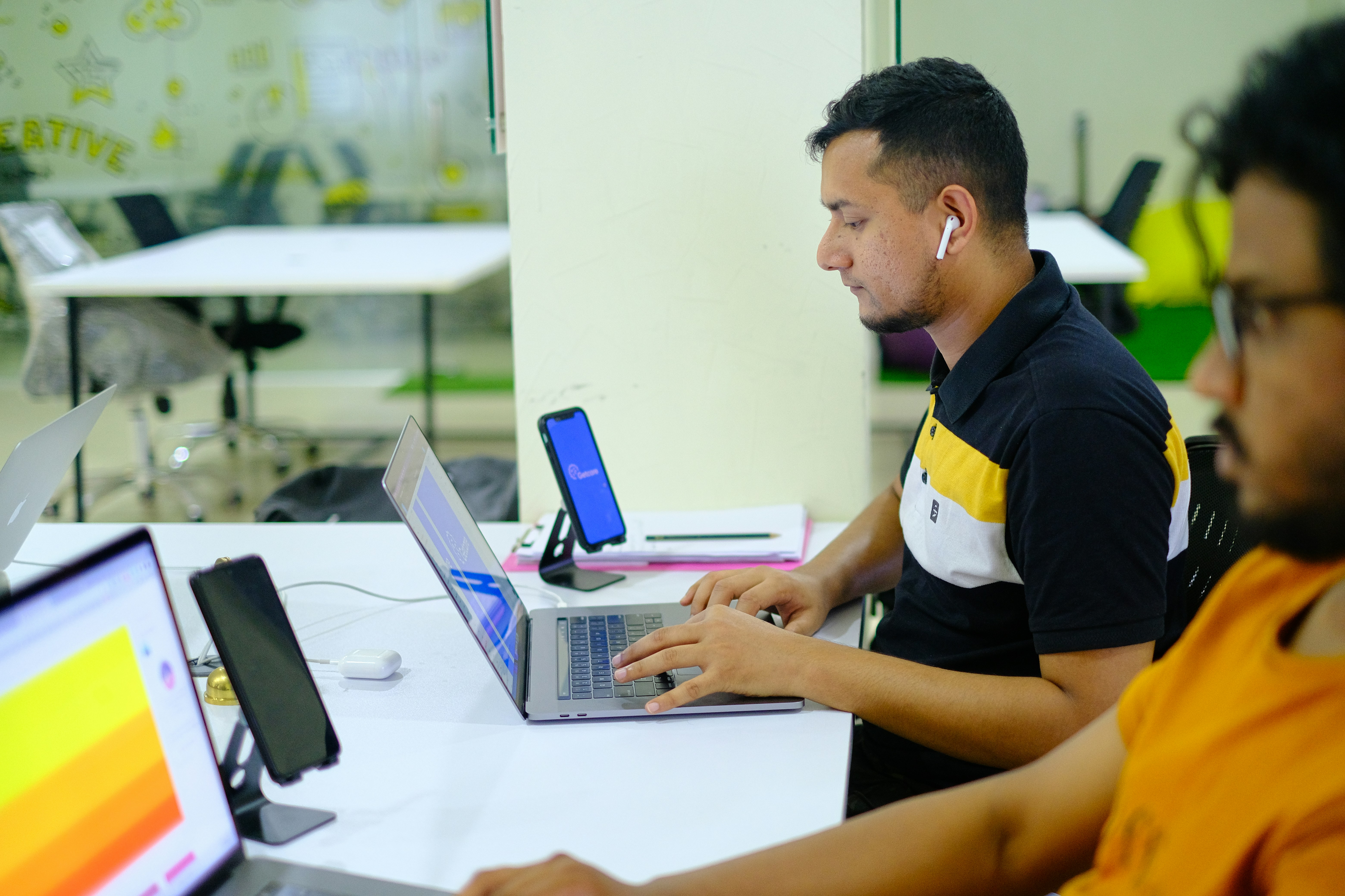 People learning on laptops