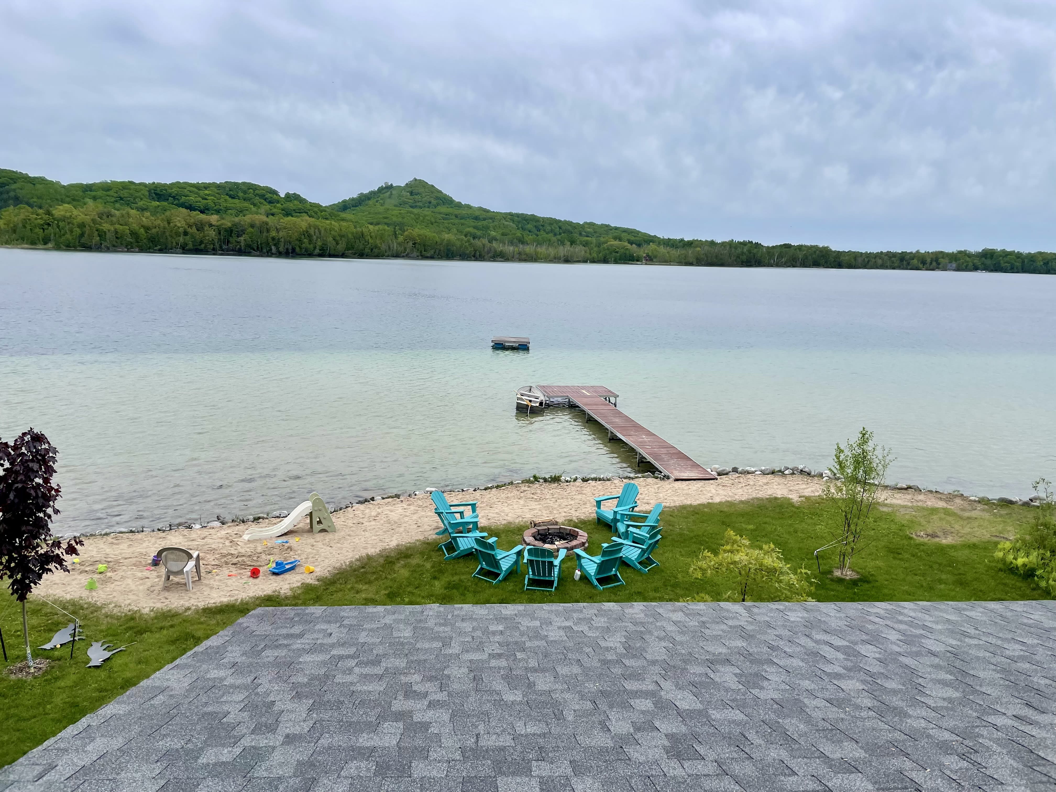 Beach, fire pit and dock from above