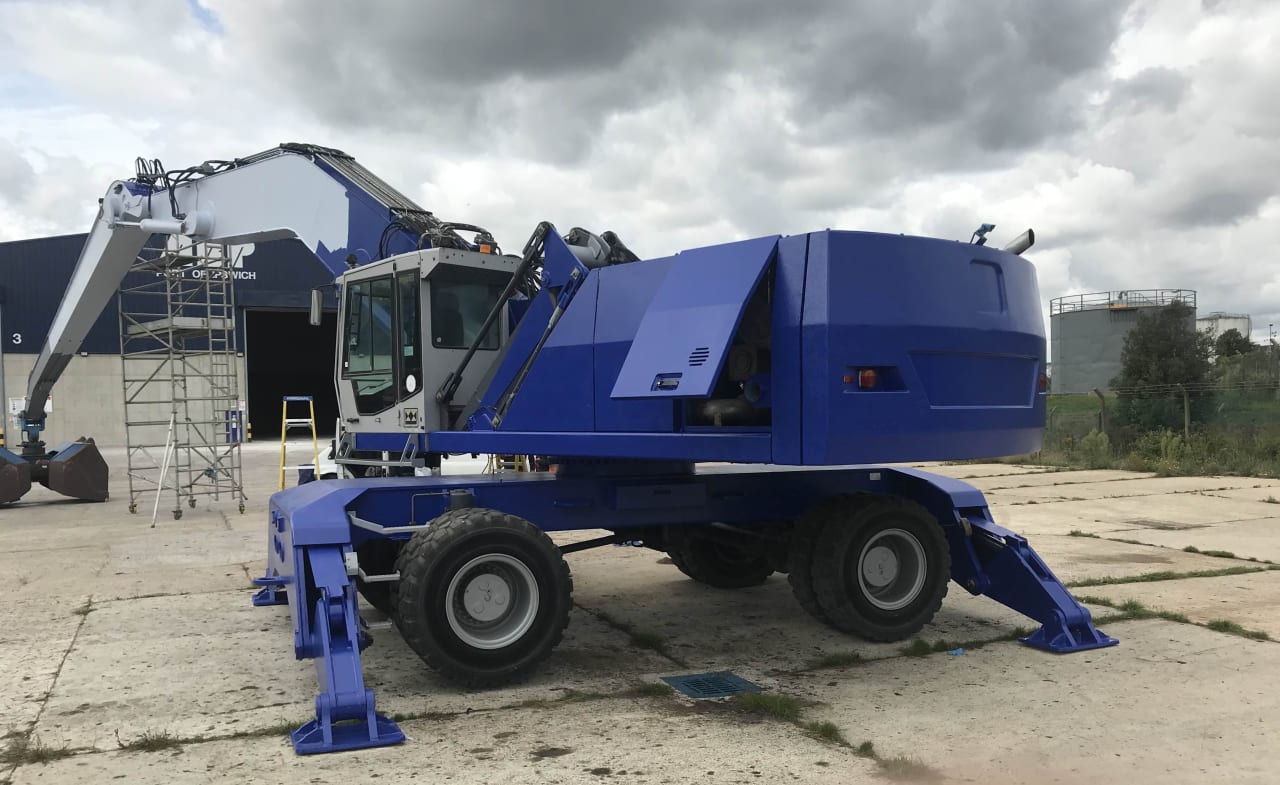 Restored industrial crane after preparation and recoating.