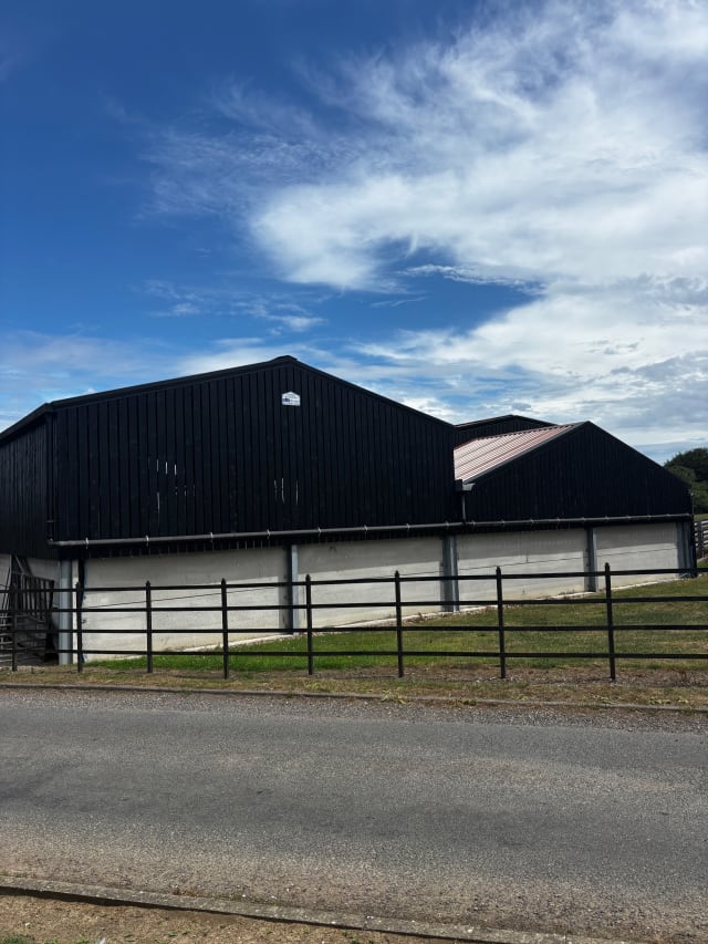 Completed barn elevation from the yard.