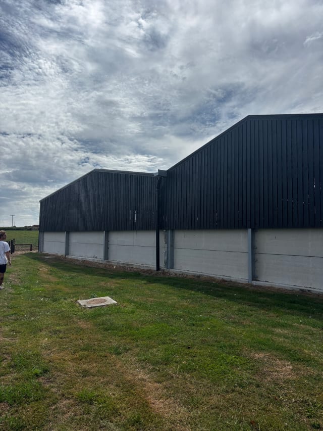 The same elevation after preparation and full coating build.