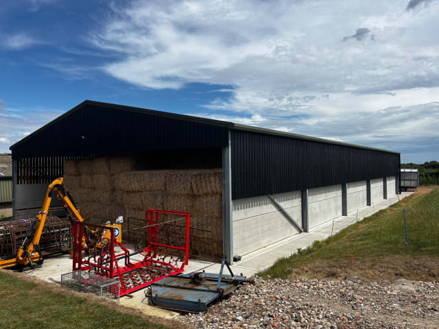 Wider view of the completed barns on handover.