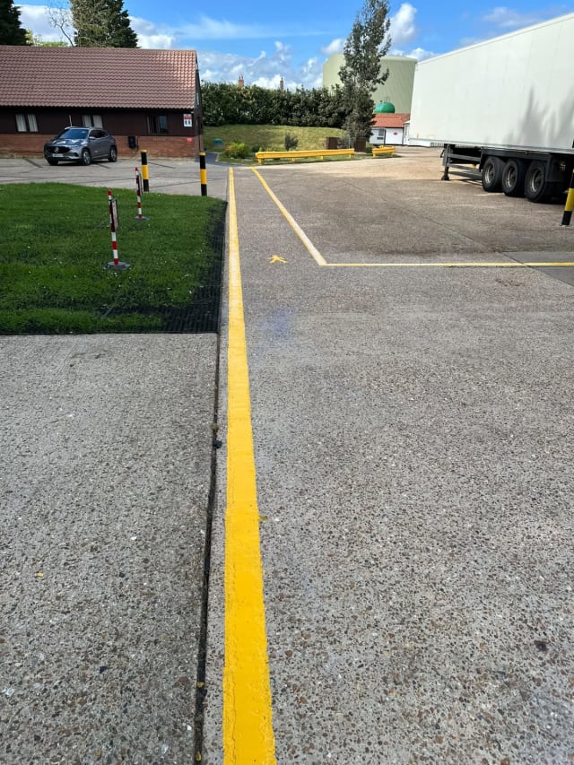 Roadline application in progress across the walkway.
