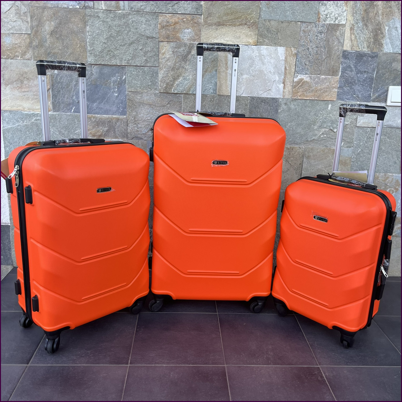 Чемодан Bloom 147 L оранжевый с кодовым замком и 4 колесами, большой, легкий и прочный для путешествий, стильный и удобный