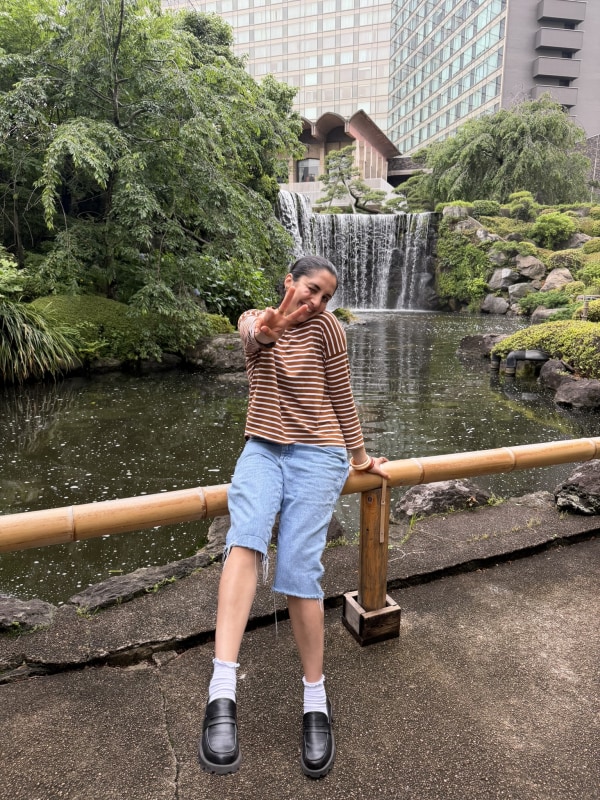 Beautiful Japanese garden with a pond and waterfall at Hotel New Ohtani Japanese Garden in Tokyo