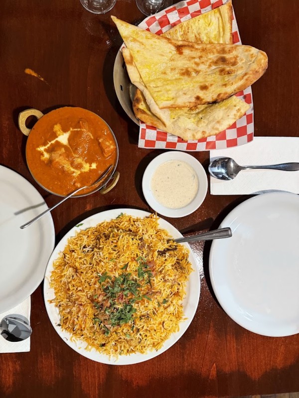 Biryani, butter chicken, and naan at Biryani Palace in Victoria