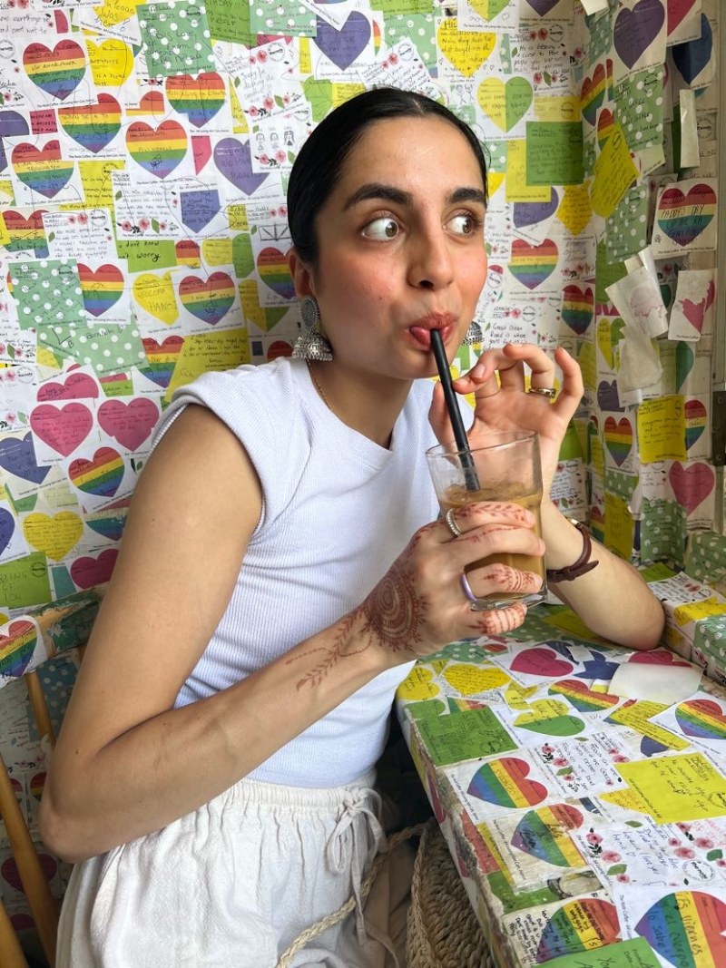 Deeva drinking Vietnamese iced coffee in Hanoi