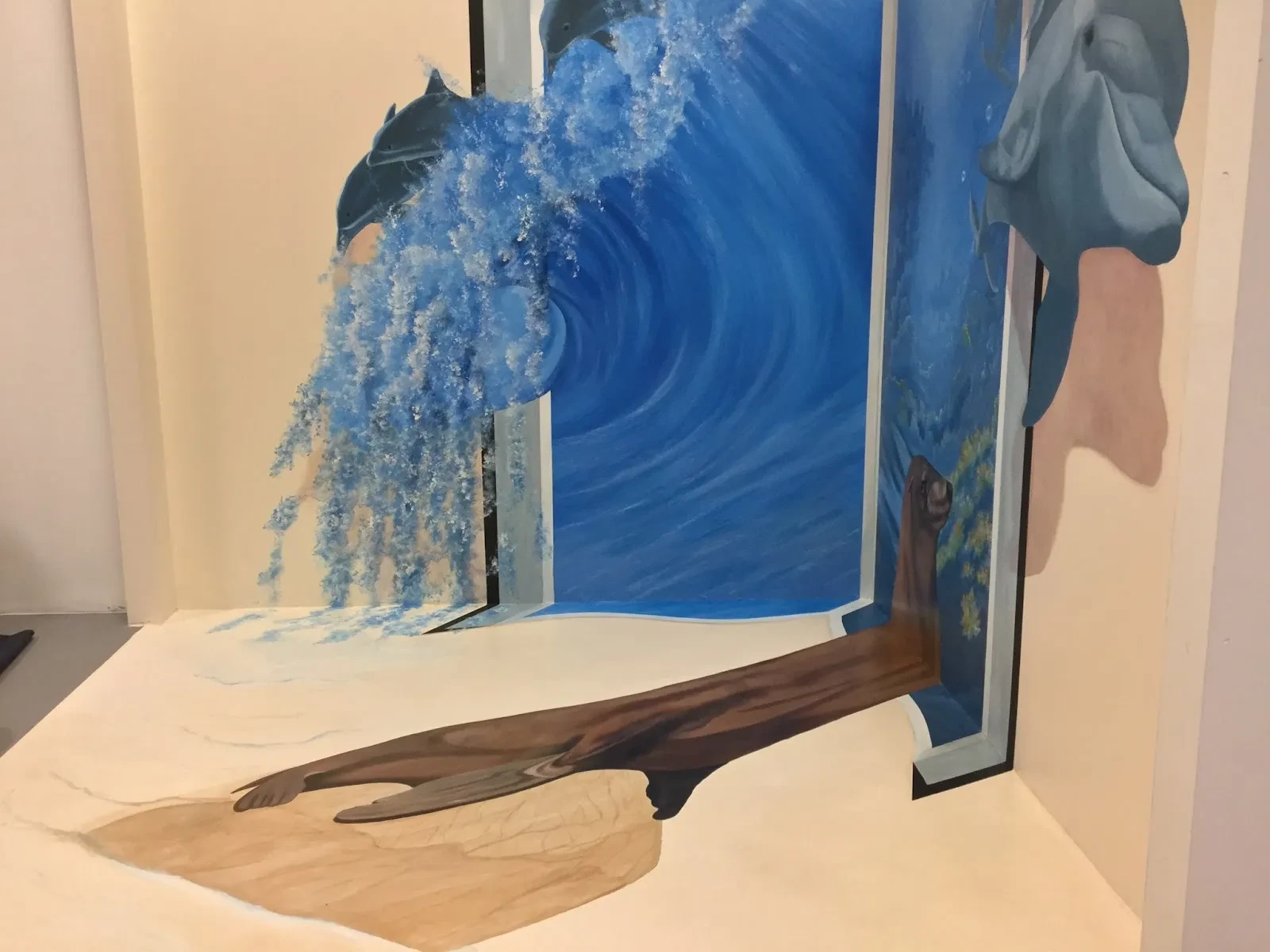 Dolphins Leaping Through Ocean Waves Mural in Las Vegas, NV