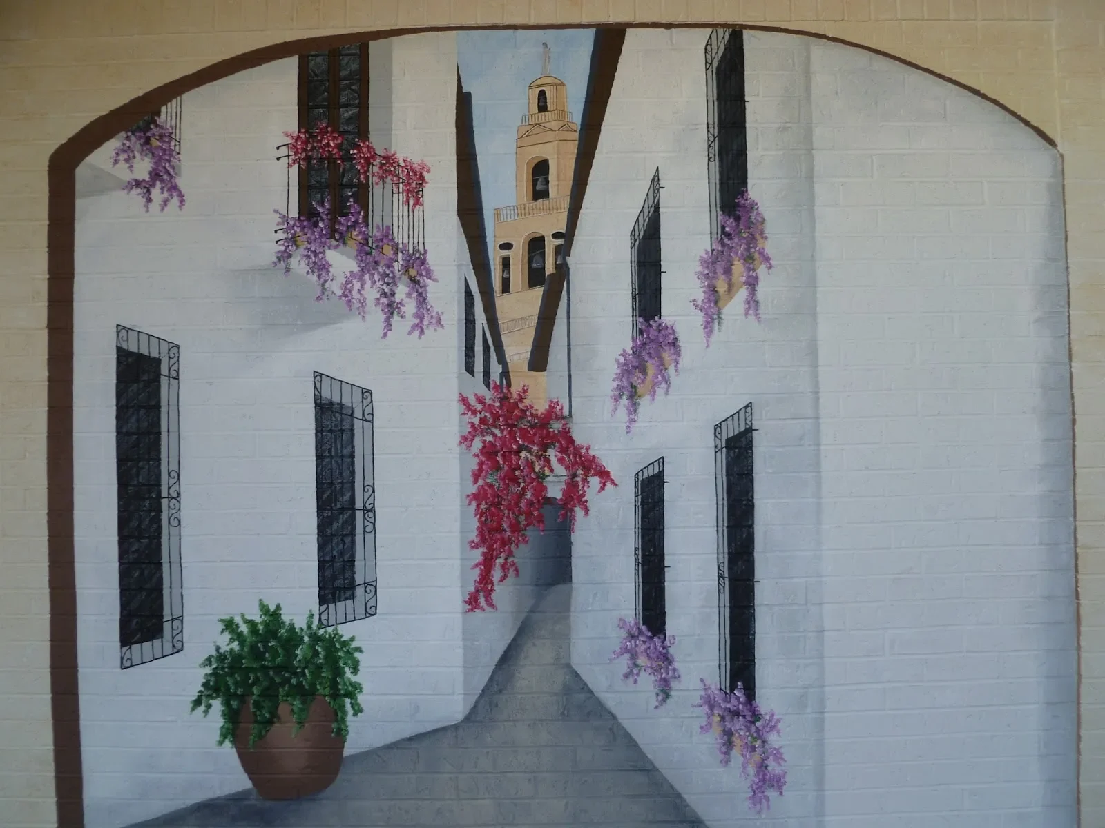 Courtyard with Cascading Wisteria and Bell Tower Mural in Las Vegas, NV