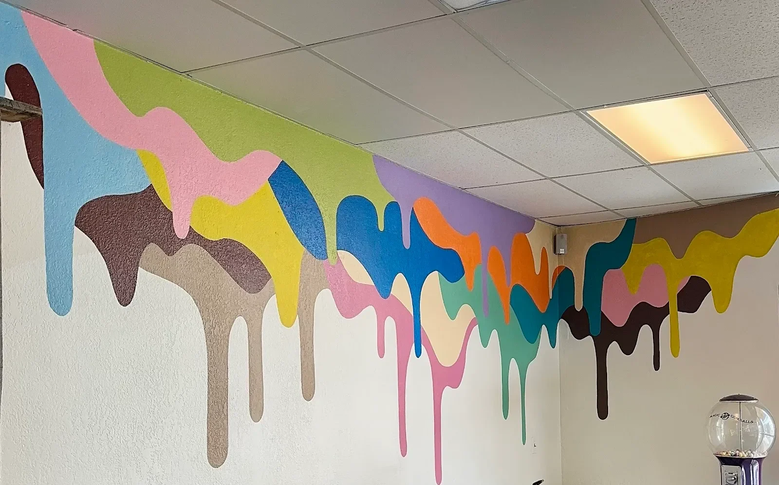 Melting Rainbow Drip Abstract Mural in Pueblo, CO