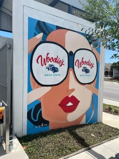 Woman with Oversized Woodies Sunglasses Mural in Tampa, FL