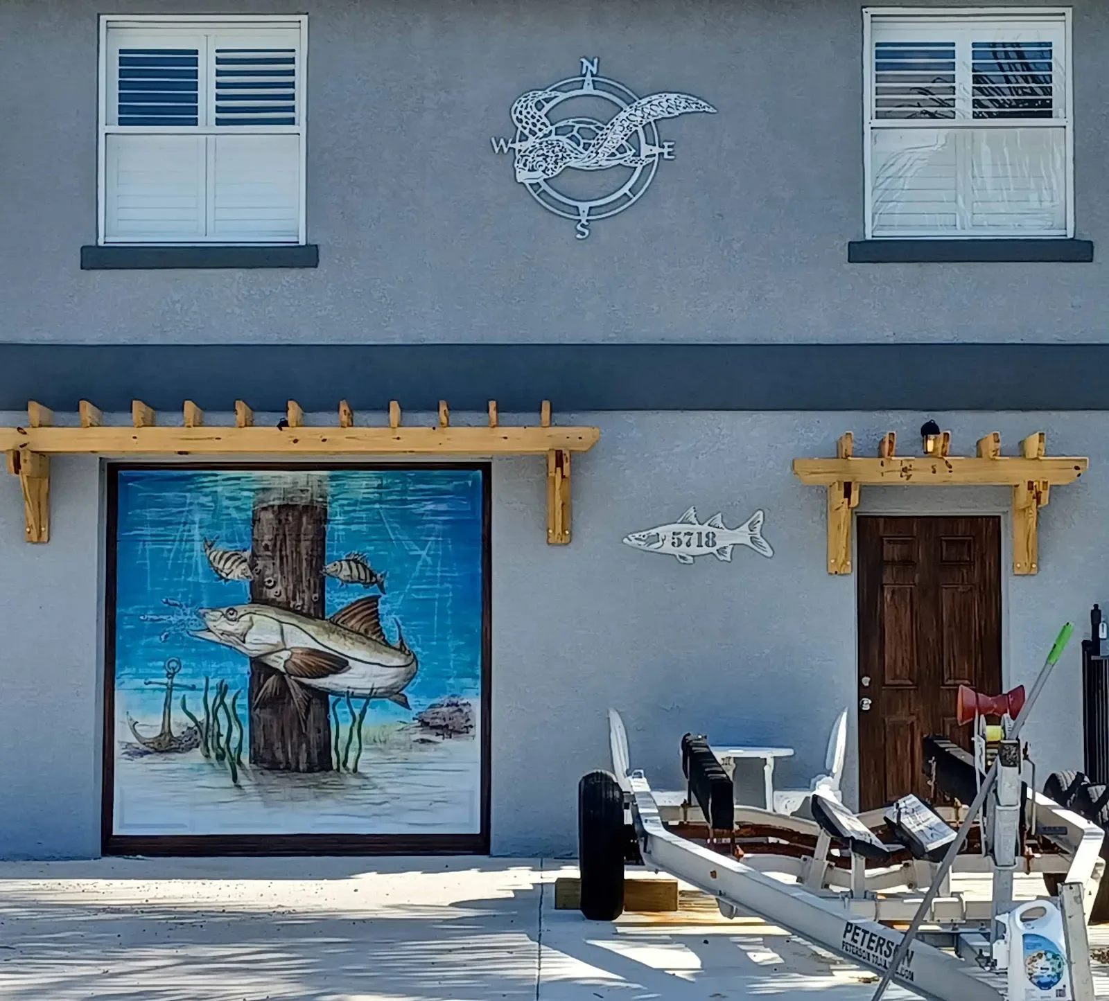 Fish Perched on Weathered Dock Piling Mural in St. Petersburg, FL