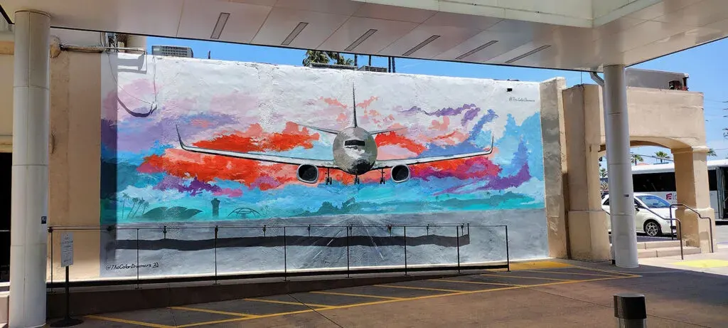 Jet Aircraft Ascending Through Colorful Clouds Mural in Hialeah, FL
