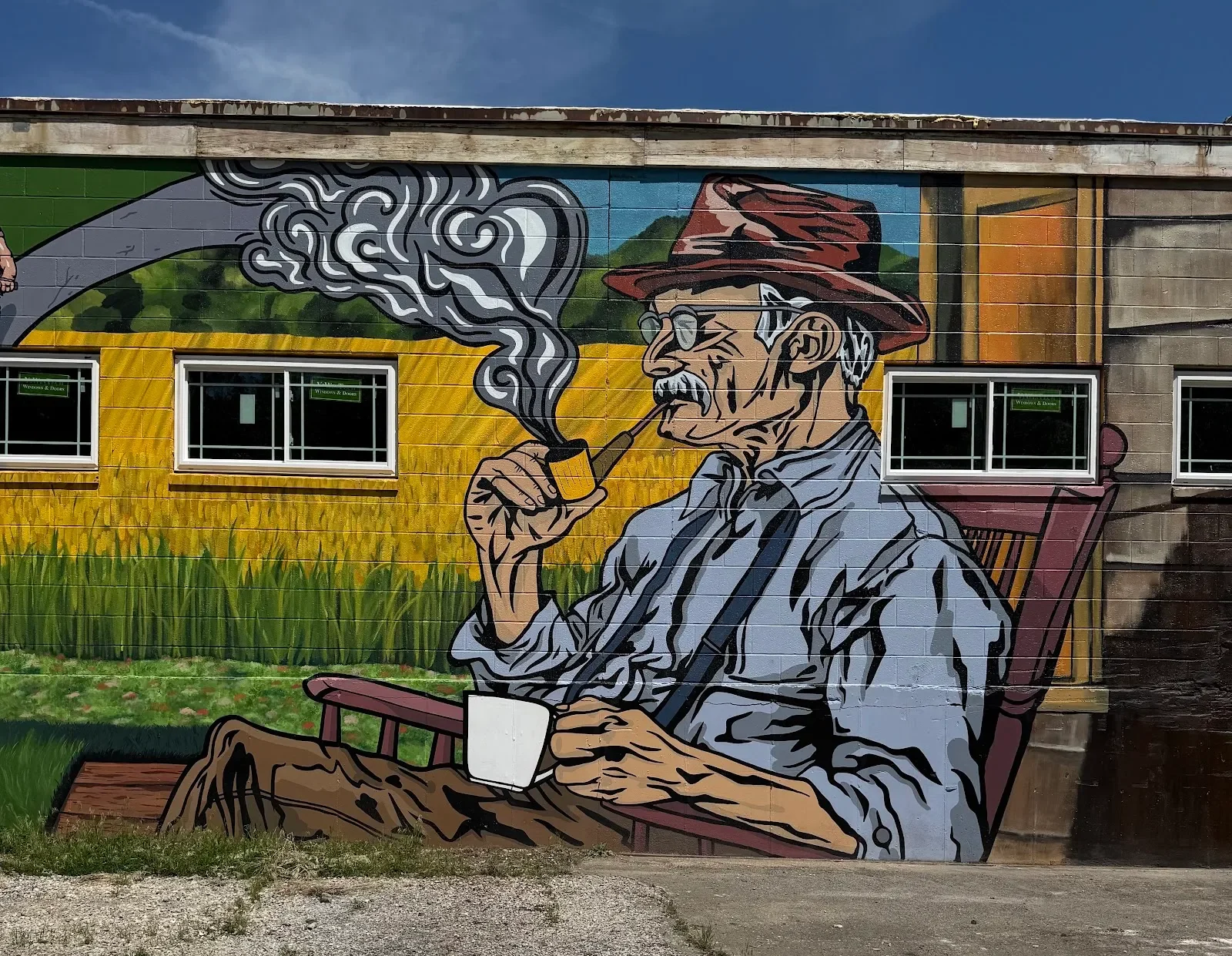 Weathered Cowboy Smoking on Bench Mural in Kansas City, MO