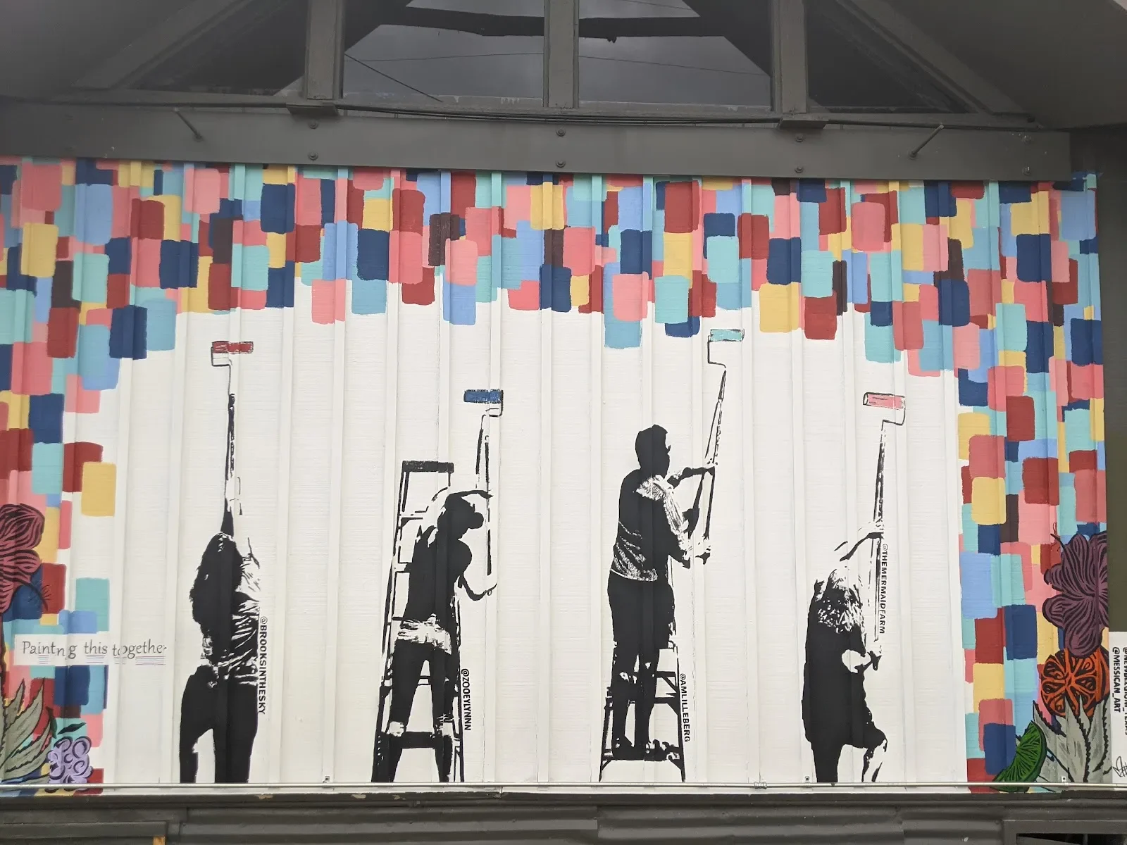 Collaborative Painters Creating Colorful Futures Mural in San Antonio, TX