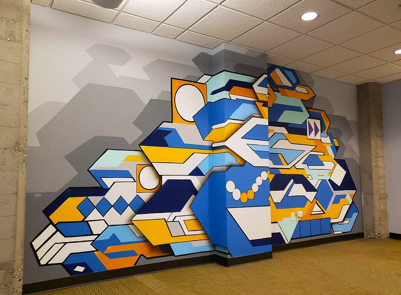 Abstract Geometric Convergence in Blue and Gold Mural in Renton, WA
